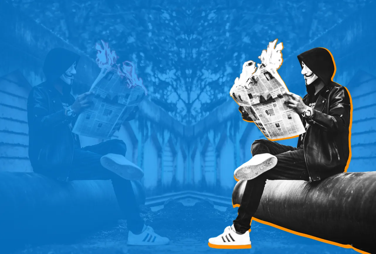 the most famous hackers in the world, annonymous sitting reading a burning newspaper
